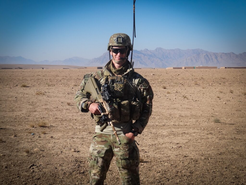 An Australian soldier stands in the Afghanistan desert.